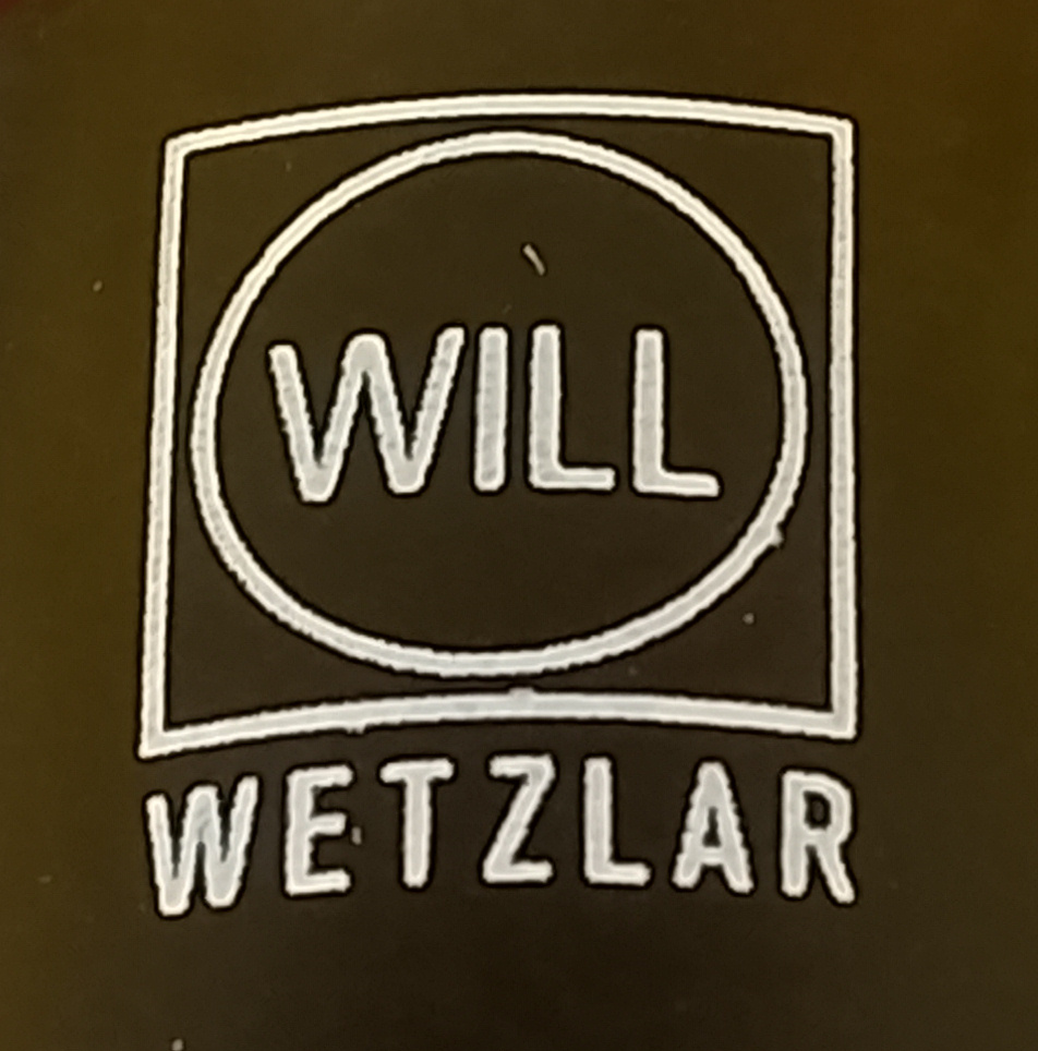Logo producenta mikroskopów Will Wetzlar